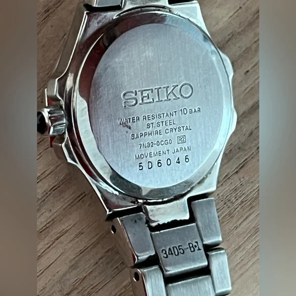 Seiko Coutura Ladies Watch Genuine Diamonds Pink Pearl Dial Stainless Bracelet